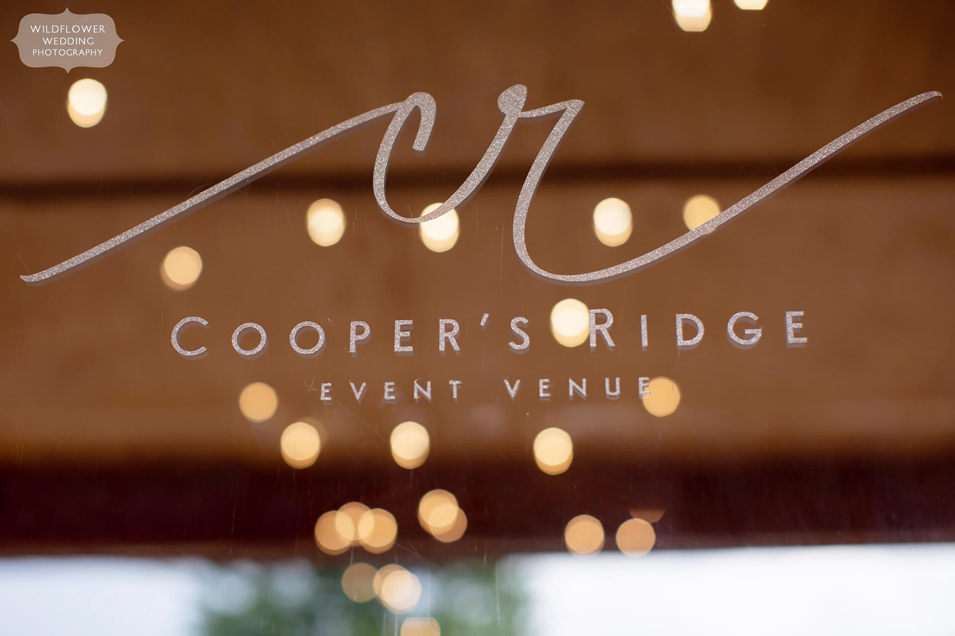 Cooper's Ridge Event Venue logo on reception hall entrance door